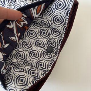 POchette à livres matelassée pour protéger les lectures en voyage