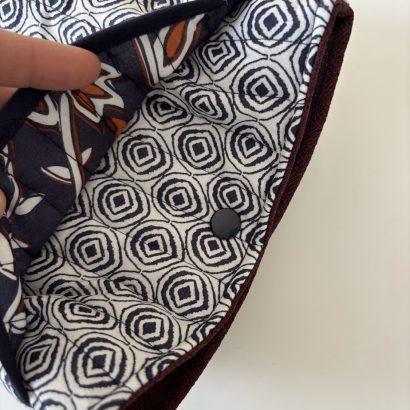 POchette à livres matelassée pour protéger les lectures en voyage